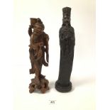 TWO TALL CARVED ORIENTAL FIGURES, ONE OF AN ELDERLY FISHERMAN, THE OTHER A RELIGIOUS FIGURE, LARGEST