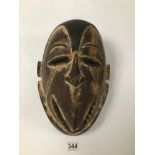 AN EARLY 20TH CENTURY PAPUA NEW GUINEA SEPIK RIVER TRIBE CEREMONIAL MASK WITH BEAK MOUTH, CARVED