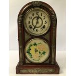 A JAPANESE AMERICAN STYLE SIMULATED ROSEWOOD AND BRASS MOUNTED DOME TOPPED MANTLE CLOCK BY OWARI