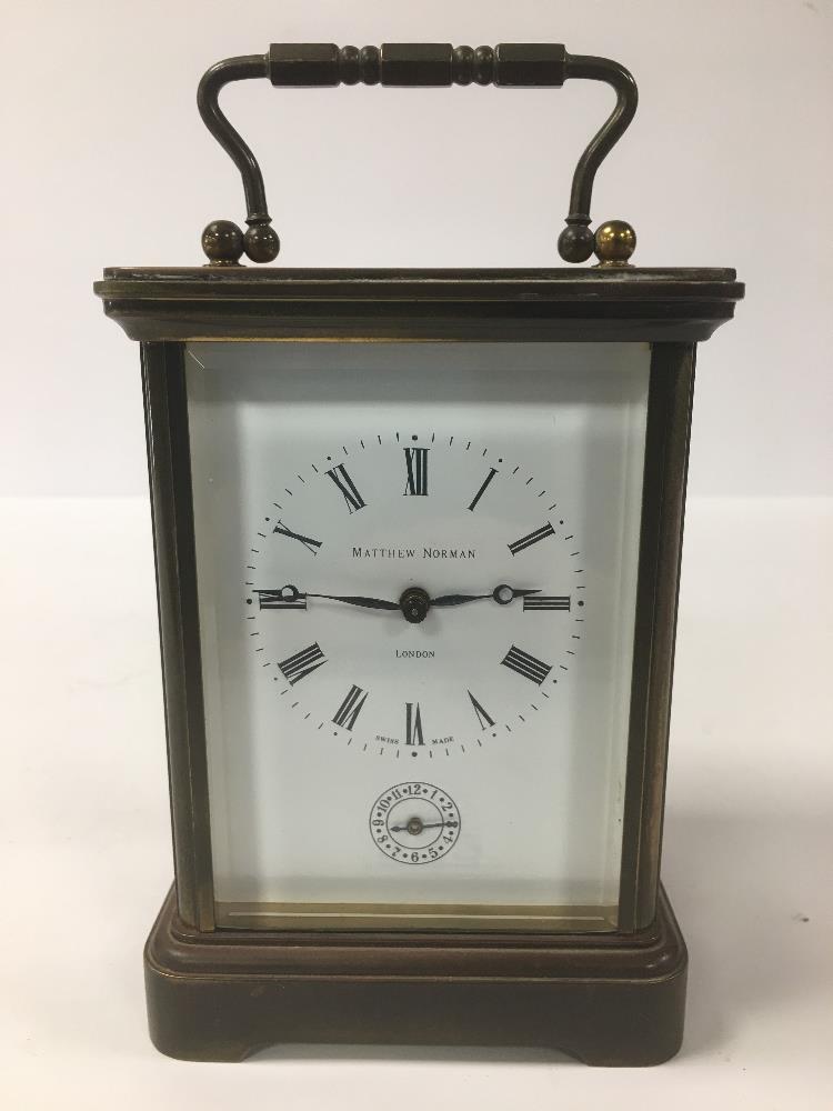 A LARGE BRASS CASED CARRIAGE CLOCK BY MATTHEW NORMAN OF LONDON, THE ENAMEL DIAL WITH ROMAN - Image 2 of 8