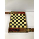 A VINTAGE GAMES BOX, OPENING TO REVEAL A CHESS BOARD WITH PIECES HIDDEN IN TWO SECRET