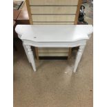 A MODERN PAINTED WHITE WOODEN CONSOLE TABLE