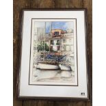 A LARGE FRAMED AND GLAZED WATERCOLOUR OF A HARBOUR SCENE AND YACHTS INDISTINCTLY SIGNED TO THE LOWER