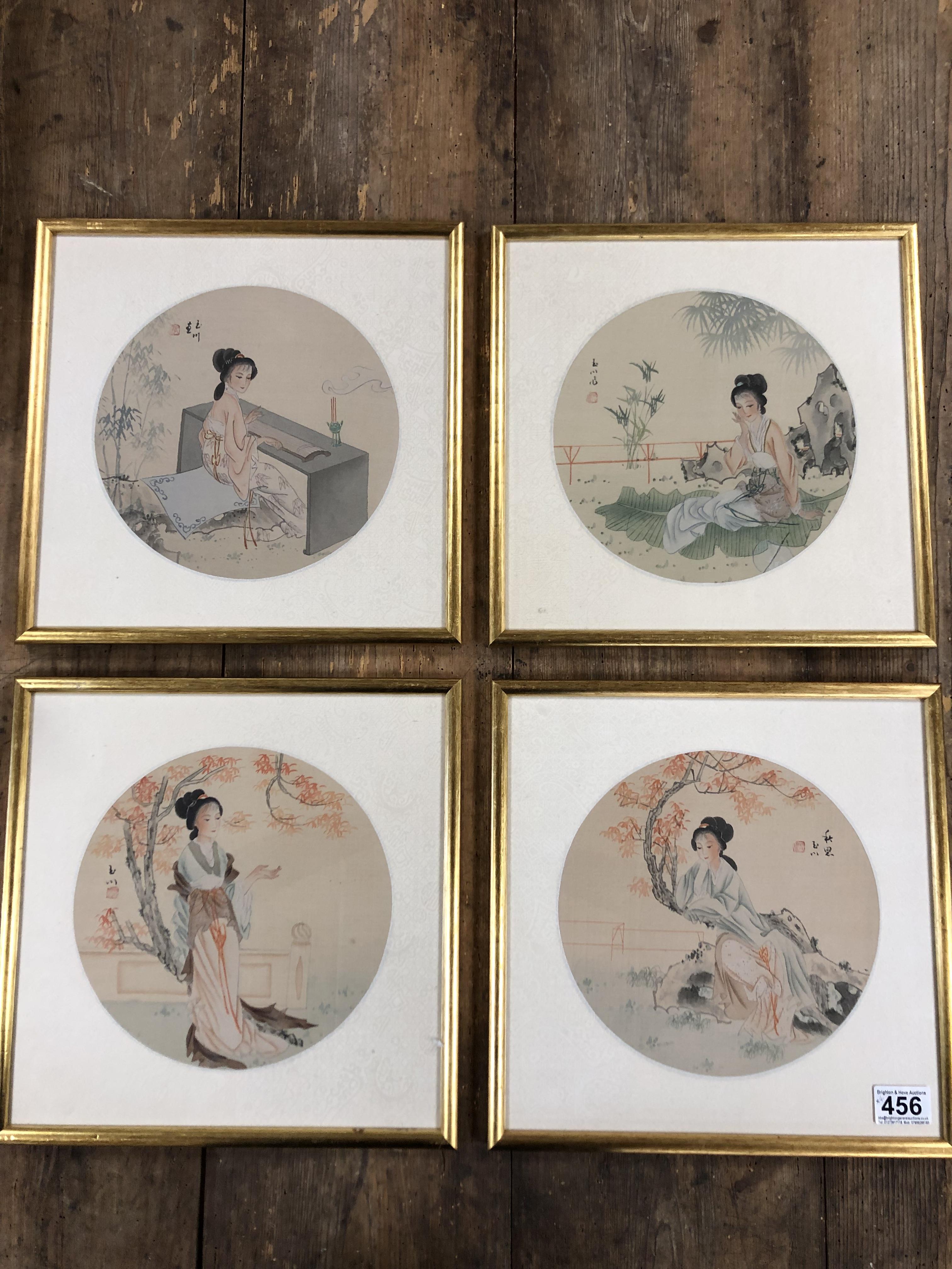 FOUR ORIENTAL PRINTS OF GEISHAS IN REPOSE WITH BAMBOO AND BLOSSOM, EACH FRAMED AND GLAZED 32CM BY