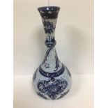 LATE 19TH CENTURY MACINTYRE FLORIAN WARE POTTERY VASE WITH TUBE LINED DECORATION OF A FLORAL SCENE