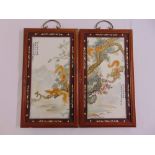 A pair of Chinese Republic period painted porcelain panels in rectangular hardwood frames