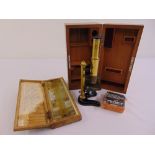 E. Leitz brass microscope in fitted mahogany case with fifty prepared slides