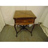 An Edwardian mahogany square inlaid envelope card table with a single drawer on four cabriole legs