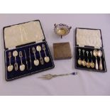 A quantity of silver to include cased teaspoons, a bonbon dish and a cigarette box (5)