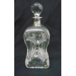 A glass glug glug decanter with silver collar and drop stopper