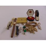 A quantity of costume jewellery to include wristwatches, necklaces and brooches