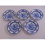 Five 19th century Meissen blue and white dishes decorated with flowers, leaves and butterflies