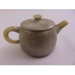 A Chinese Yixing teapot with jade handle and spout