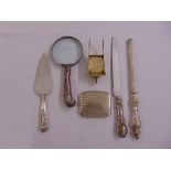 A quantity of white metal and silver plate to include a magnifying glass and carving knife (6)