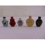A quantity of oriental snuff bottles of various shape, form and material