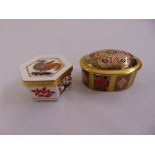 An oval Royal Crown Derby Imari covered box and a Royal Crown Derby hexagonal covered box