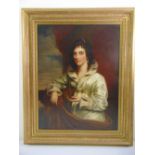 A framed oil on canvas portrait of a Regency society lady, 90.5 x 69.5cm