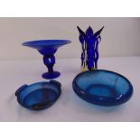 A quantity of mid 20th century blue glass to include a tazza and two bowls