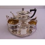 Silver plated three piece teaset part fluted on circular salver with gadrooned border