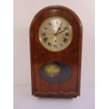 A mahogany cased wall regulator, silvered dial, Roman numerals, three train movement, to include key
