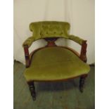 A Victorian upholstered occasional chair on turned mahogany legs