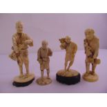 Four 19th century ivory oriental figurines on raised bases all signed