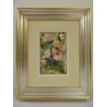 A framed oil on panel of flowers indistinctly signed bottom left, gallery details to verso, 14 x