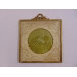 A continental square gilded metal and embroidered silk picture frame