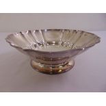 A Victorian silver fruit bowl, circular, fluted sides on raised circular base, marks rubbed, circa