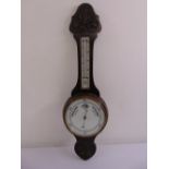 An oak cased wall mounted banjo barometer and thermometer
