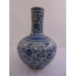 A 19th century Chinese blue and white bottle vase the globular body and cylindrical neck decorated