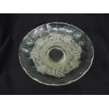A glass dish decorated with silver overlay and stylised flowers