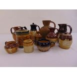 A quantity of Royal Doulton Lambethware jugs, jars and teapots (11)