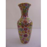 An oriental ovoid vase decorated with stylised flowers and leaves