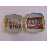 A pair of shaped rectangular continental wall plates, the centres hand painted with figures