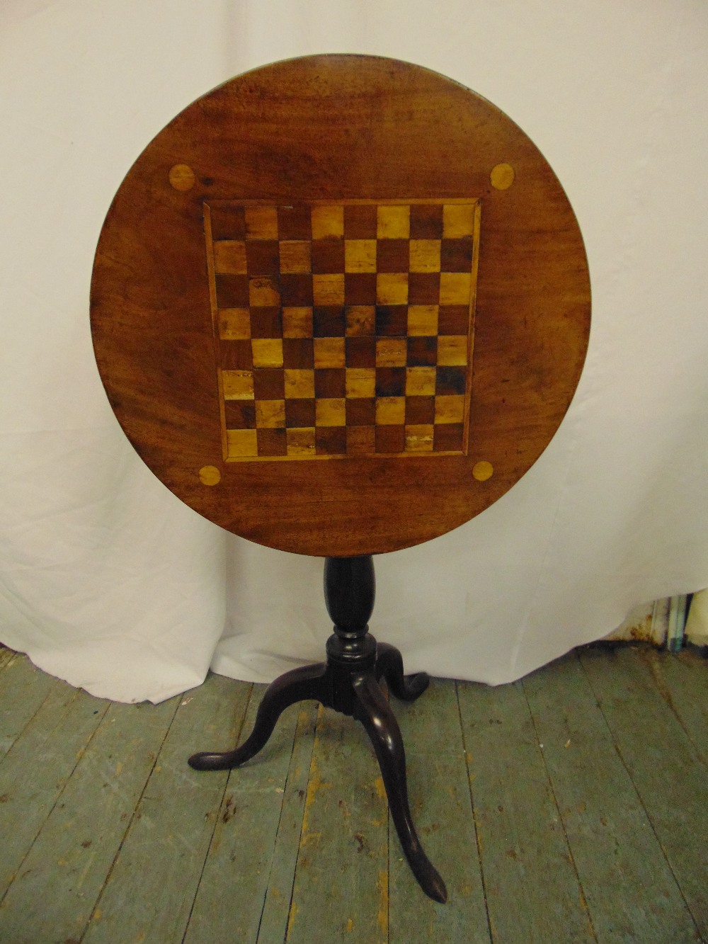 Late 19th/early 20th century tilt top table, inset with a chess board on three outswept legs