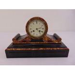A black marble mantle clock, white enamel dial, Roman numerals, two train movement