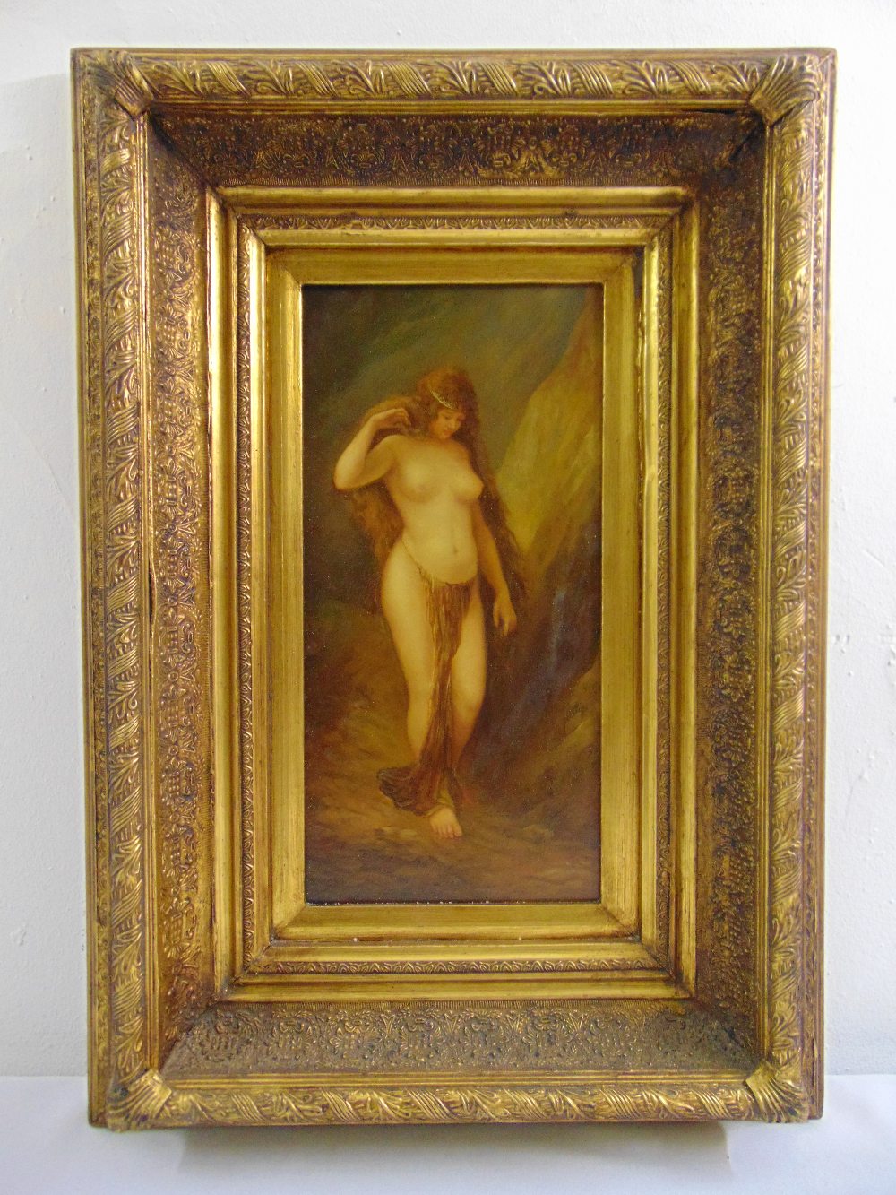 A framed oil on panel of an exotic female nude in the classical style, 39.5 x 19cm