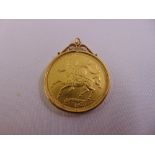£5 gold coin 1973 set in 9ct gold pendant, approx total weight 42.9g