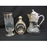An Art Nouveau style glass and silver plated claret jug, a glass vase with silver mounts and