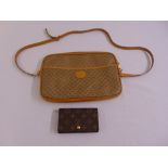Louis Vuitton ladies leather purse and a Gucci ladies handbag