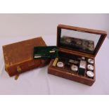 A Victorian gentlemans fitted dressing case the interior revealing silver glass jars and a