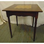 An Edwardian square mahogany games table with inlaid chess board, on four turned legs