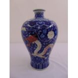 A Chinese Meiping baluster vase decorated with a dragon and flowers