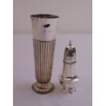 A Victorian silver sugar castor of panelled form, Birmingham 1897 and a silver vase part fluted on