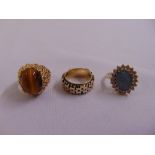 Three 9ct yellow gold rings, two set with stones, approx total weight 18.8g