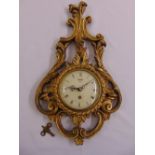 Smiths gilded wooden frame baroque style wall clock, single train movement, white enamel dial, Roman