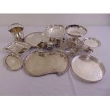 A quantity of silver plate to include a fruit stand, trays and dishes