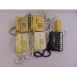 Six vintage plastic telephones to include three BT, two Audioline and a Venturer