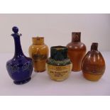 A quantity of Doulton Lambeth ceramics to include a John Dewar and Sons Whisky jug, a blue ground